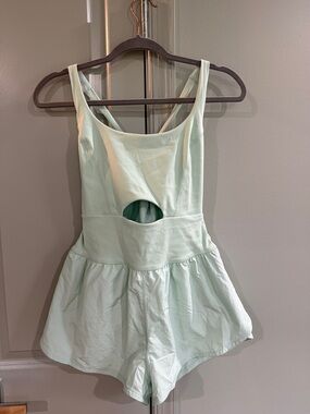 NEVER WORN. Free People Movement Mint Green Sleeveless Romper with Cutout